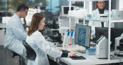 Scientists Working in Laboratory Video stock 283078145