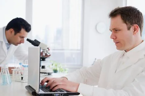 Scientists working in laboratory Stock Photos