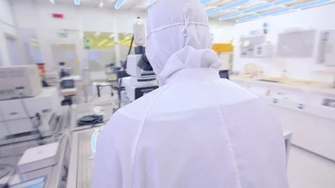 Scientists Working In A Microscope Nano Technology Cleanroom Facility Stock Footage 92864310