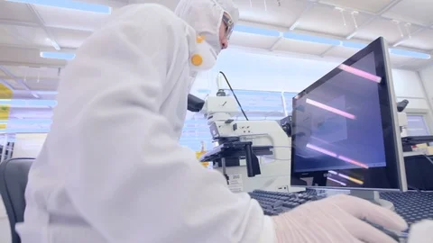 Scientists Working In A Microscope Nano Technology Cleanroom Facility Stock Footage 92864602