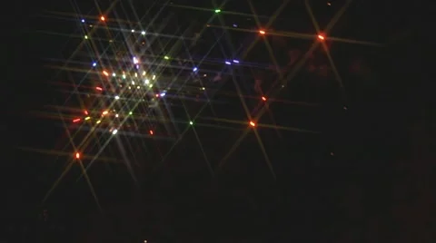 Scintillating Amazing Night Fireworks with Light Rays Stock Footage
