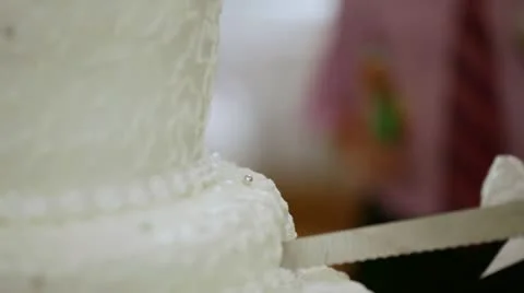 Scission of wedding cake Stock Footage 12032479