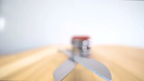 The scissor part of the swiss knife on the table Stock Footage 135698461