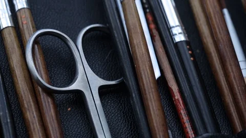 Scissors and brushes for Makeup artists Macro 100mm slider camera smooth motion Stock Footage 114490366