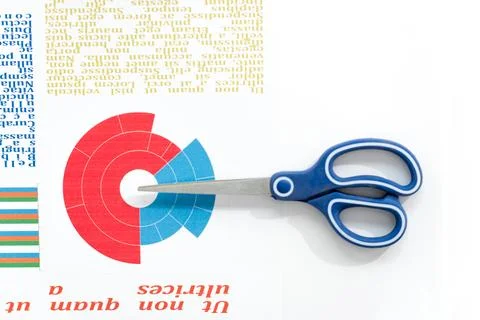 Scissors and business chart Stock Photos