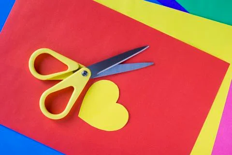 Scissors and colored paper Stock Photos