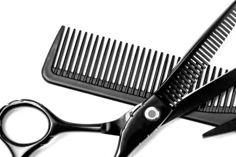 Scissors and comb Stock Photos
