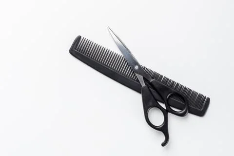 Scissors and comb Stock Photos