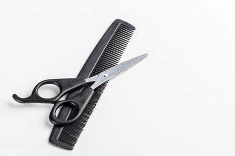 Scissors and comb Stock Photos