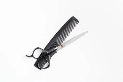 Scissors and comb Stock Photos