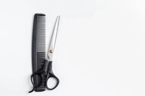 Scissors and comb Stock Photos