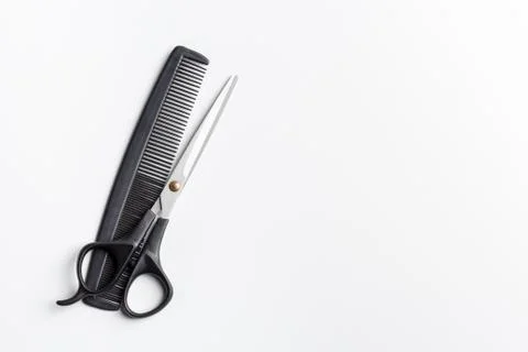 Scissors and comb Stock Photos