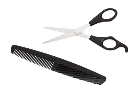 Scissors and comb Stock Photos