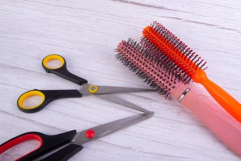 Scissors and comb with white background, Barbershop concept. Stock Photos
