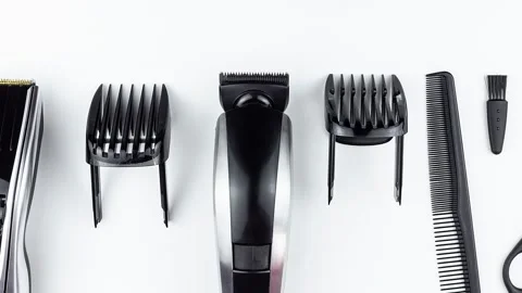 Scissors and combs on white Stock Footage 178031174