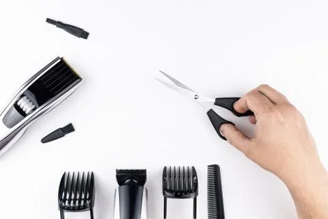 Scissors and combs on white Stock Photos