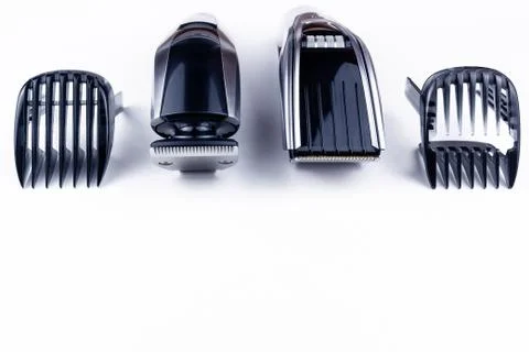 Scissors and combs on white Stock Photos