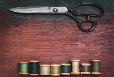 Scissors and old threads Stock Photos