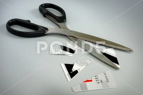 Scissors and pieces of credit card.Get out of debt. Stock Photos