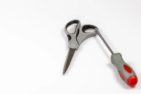 Scissors and screwdriver Stock Photos