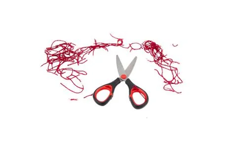 Scissors and thread  on white Stock Photos