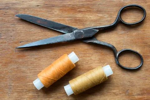 Scissors and threads Stock Photos