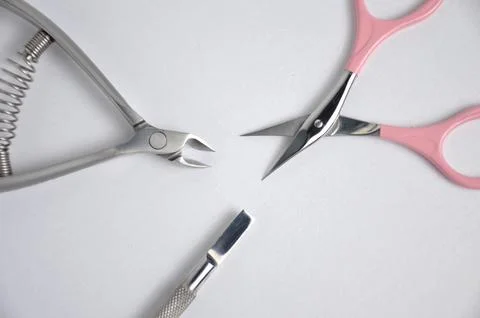 Scissors and wire cutters on a white background. Stock Photos