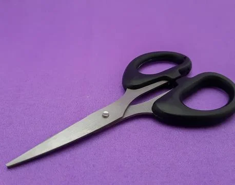 Scissors with black handled Stock Photos