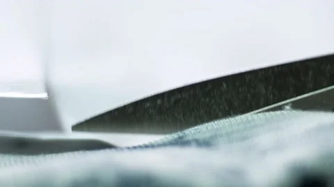 Scissors close-up cut the fabric according to the pattern Stock Footage 170562247