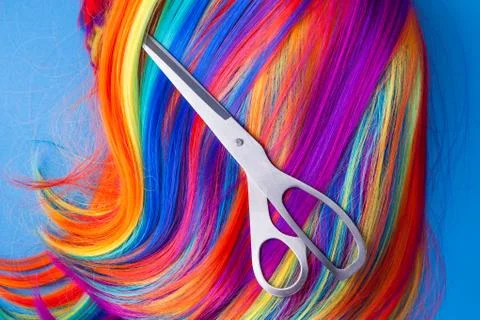 Scissors with color wig Stock Photos