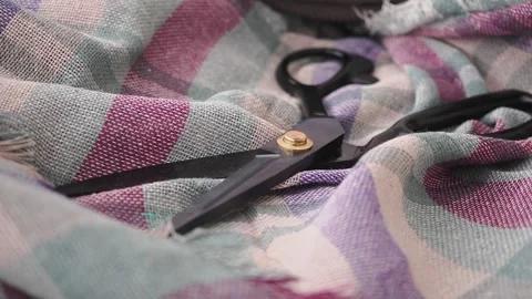 Scissors on colorful fabric in crafting activity at home Video stock 346016767