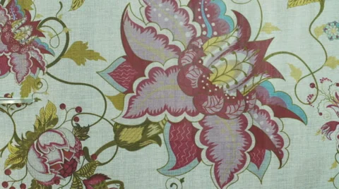 Scissors cut a bright and beautiful fabric Stock Footage 63633393