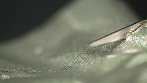 Scissors cutting cloth Stock-Footage 77046656