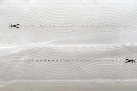 Scissors Cutting Icon on Packaging. Stock Photos