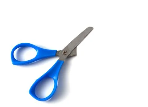 Scissors cutting paper Stock Photos