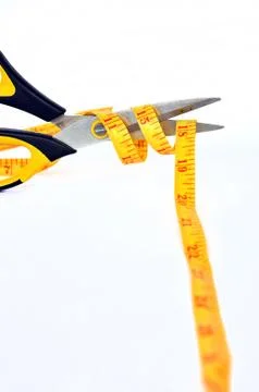 Scissors cutting Stock Photos