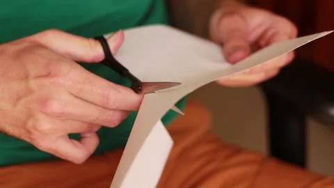 Scissors cutting a sheet of paper 動画素材 74292014