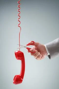 Scissors cutting telephone connection Stock Photos