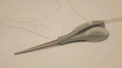 Scissors on a design table Stock Footage 9263038