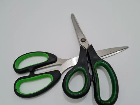 Scissors with green handles 写真素材