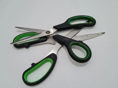Scissors with green handles 写真素材