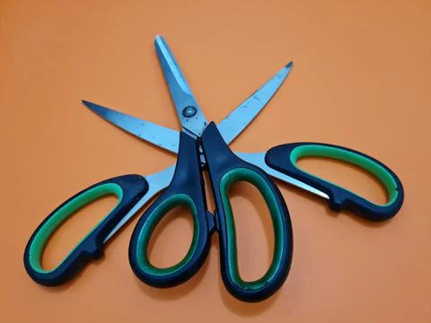 Scissors with green handles 스톡 사진