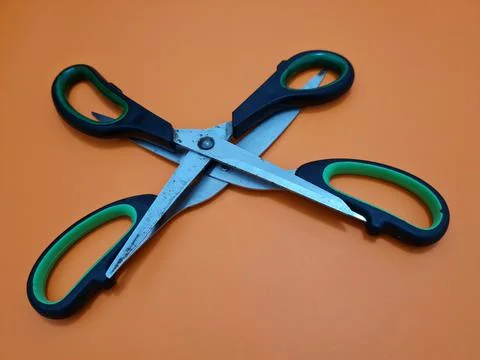 Scissors with green handles 写真素材