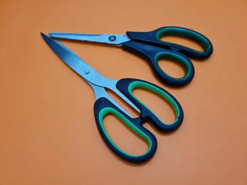 Scissors with green handles 写真素材