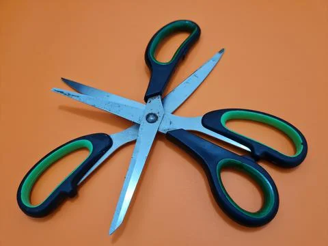 Scissors with green handles 写真素材