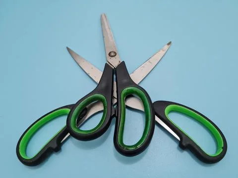Scissors with green handles Stockfoto's