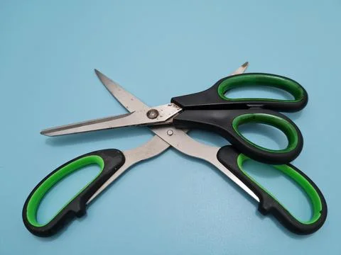 Scissors with green handles 写真素材