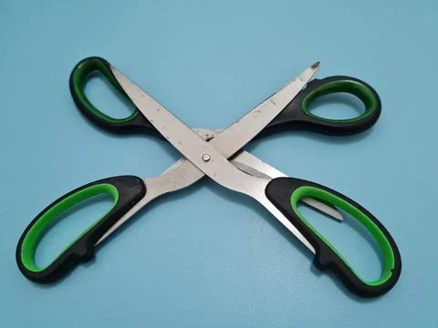 Scissors with green handles 写真素材
