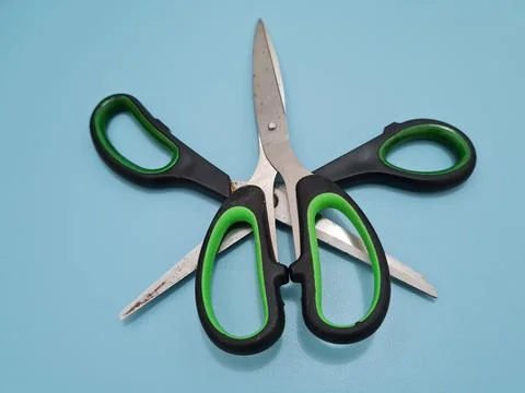Scissors with green handles Stockfoto's