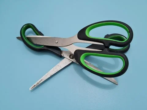 Scissors with green handles 스톡 사진